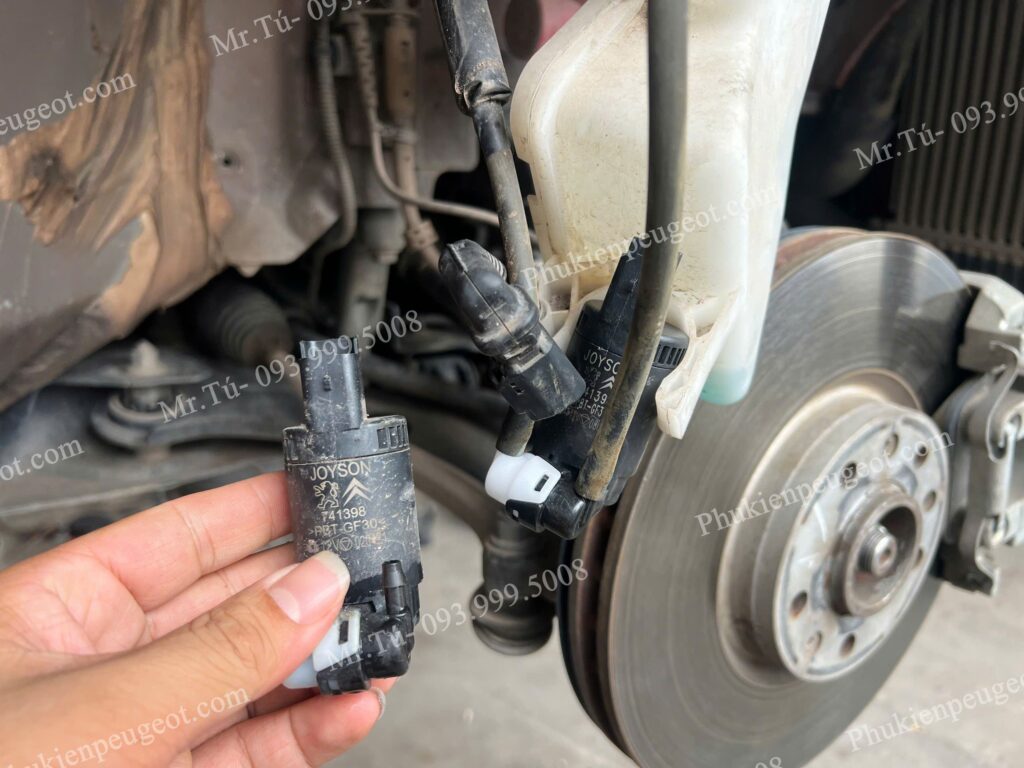 Mô tơ bơm nước rửa kính xe Peugeot